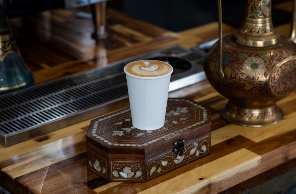 Barista poured latte to perfection at Mint Coffeehouse