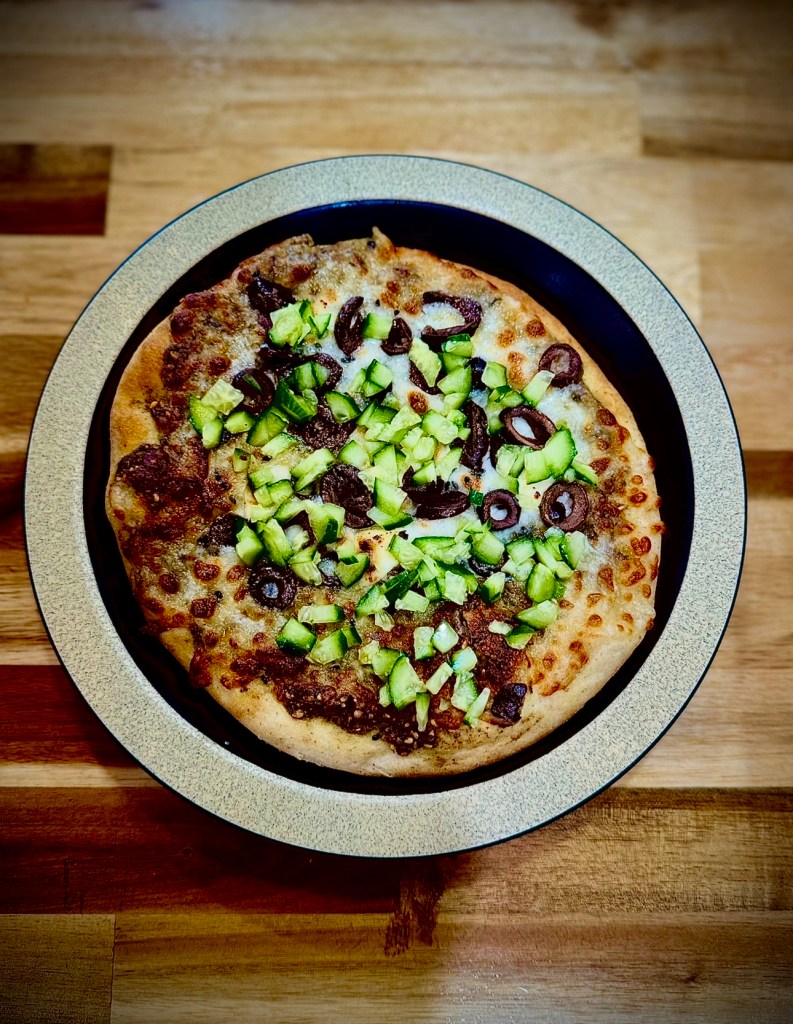 Mint Coffeehouse offers food onsite including Cheesy Za'atar Menaesh