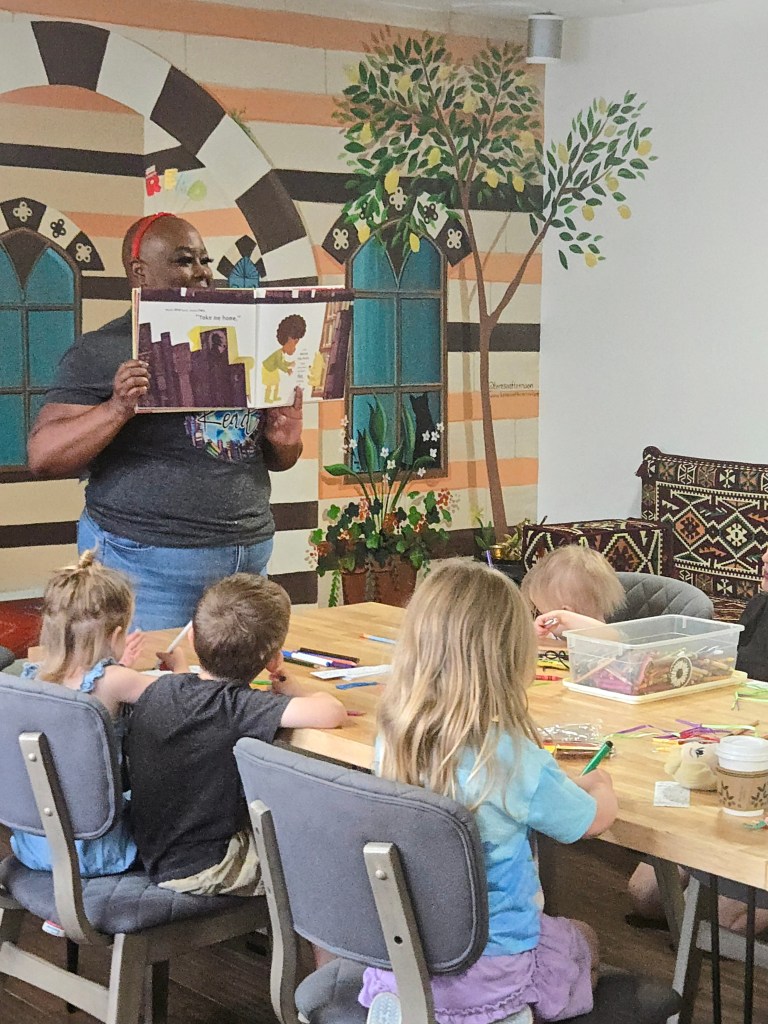 Children engaged at Mint Coffeehouse during Saturday story time