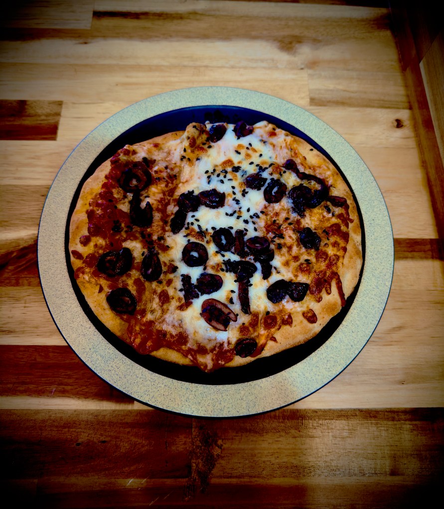 Fresh cheesy tomato and red pepper Menaesh at Mint Coffeehouse