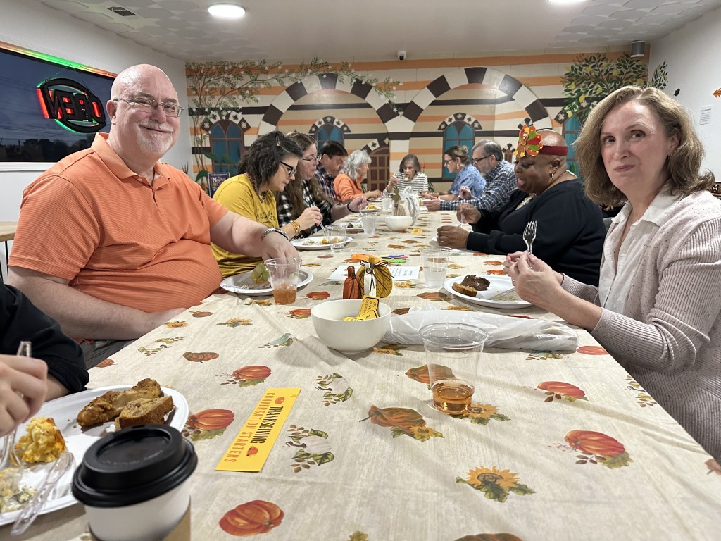 New friendships forming at Mint Coffeehouse's Thanksgiving Community Potluck